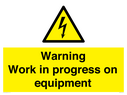 warning-work-in-progress-on-equipmentwith-electrical-hazard-symbol~